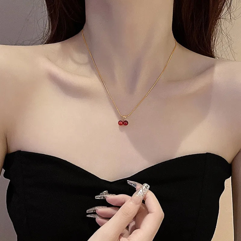 The 2025 summer classic sweet wine red cherry pendant necklace is a fashionable and individual fruit golden chain necklace for w